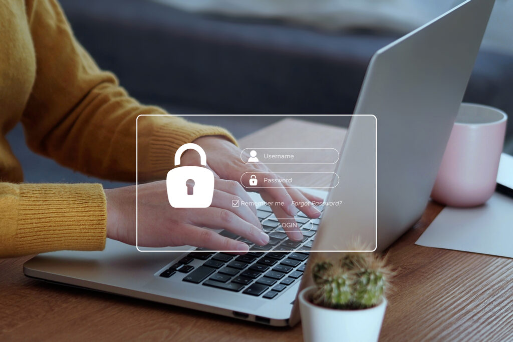 Cyber security concept, Woman hand typing on keyboard with login and password on screen display. Data protection and secured internet access.