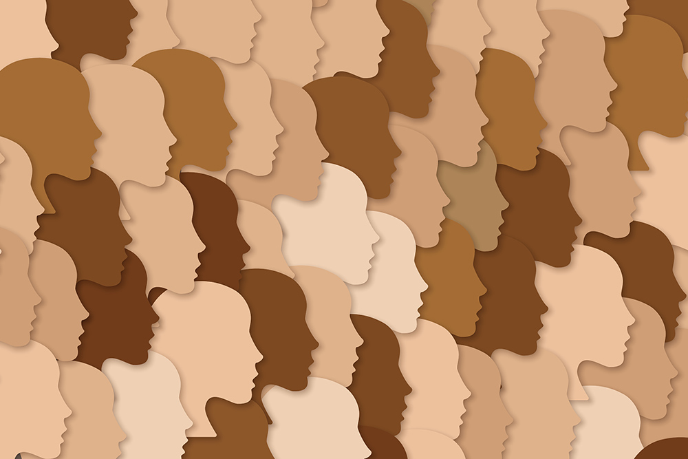 Race and Ethnicity: National diverse or race diverse concept. Female face silhouettes with variety of skin tones.