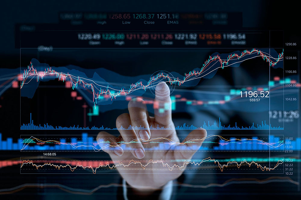 Businessman touching stock market graph on a virtual screen display.